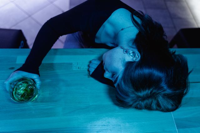 Woman passed out from drinking.